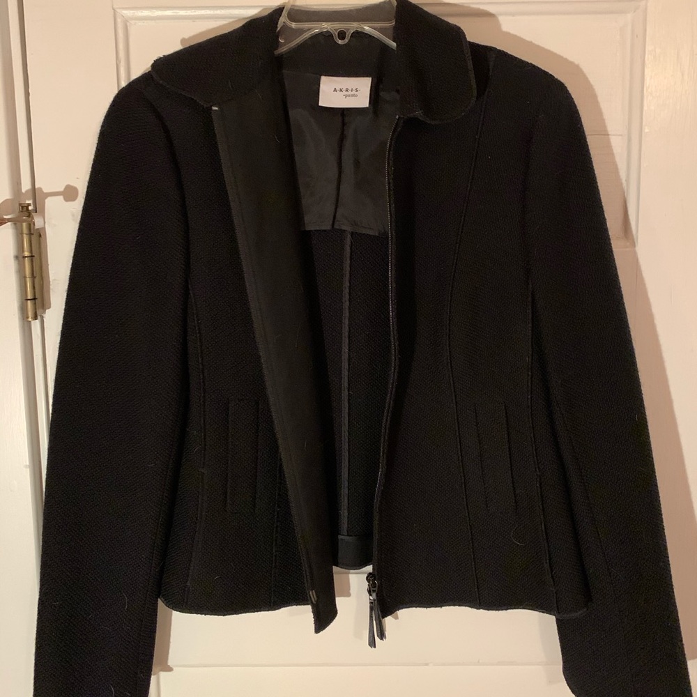 Black zip up jacket.